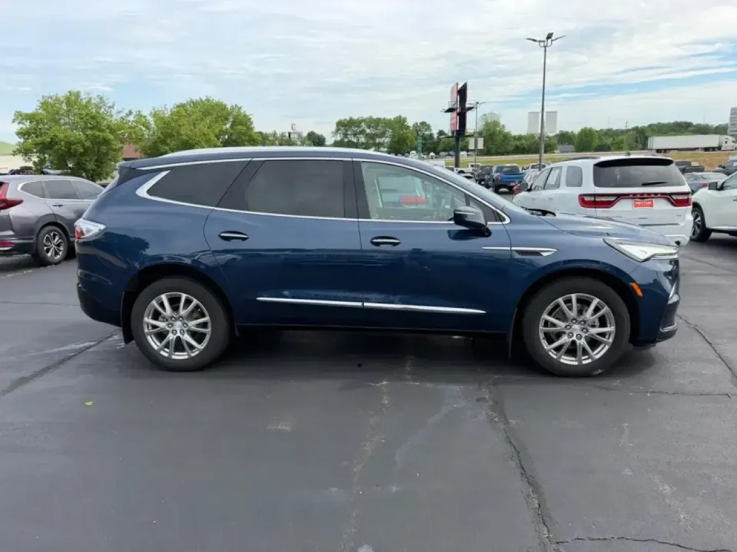 2022 /Whisper Beige seats with Ebony interior accents Le Buick Enclave Premium Group (5GAEVBKWXNJ) with an 3.6L V6 engine, Automatic transmission, located at 970 Woodlawn Dr., Farmington, MO, 63640, (573) 431-7800, 37.825642, -90.468674 - Make every day feel like a first-class road trip in a three-row SUV that's ready for school runs, long commutes, and weekend escapes to the Ozarks. This **2022 Buick Enclave Premium Group** delivers the kind of quiet comfort, confident traction, and family-friendly space that fits life in and around - Photo#1