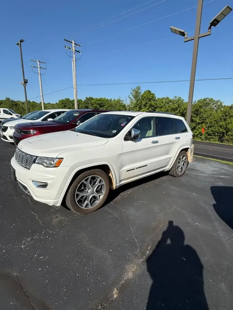 2019 /Light Frost/Brown Jeep Grand Cherokee Overland (1C4RJFCG7KC) with an 3.6L V6 DOHC 24V engine, 8A transmission, located at 12830 Highway 21, De Soto, MO, 63020, (636) 337-7777, 38.153099, -90.573624 - If your weekends bounce between school drop-offs, I55 commutes, and spontaneous getaways to the Ozarks, this 2019 Jeep Grand Cherokee Overland 4WD is built for that do-it-all lifestyle-refined enough for date night in De Soto, tough enough for gravel roads, and comfortable enough for long highway mi - Photo#0