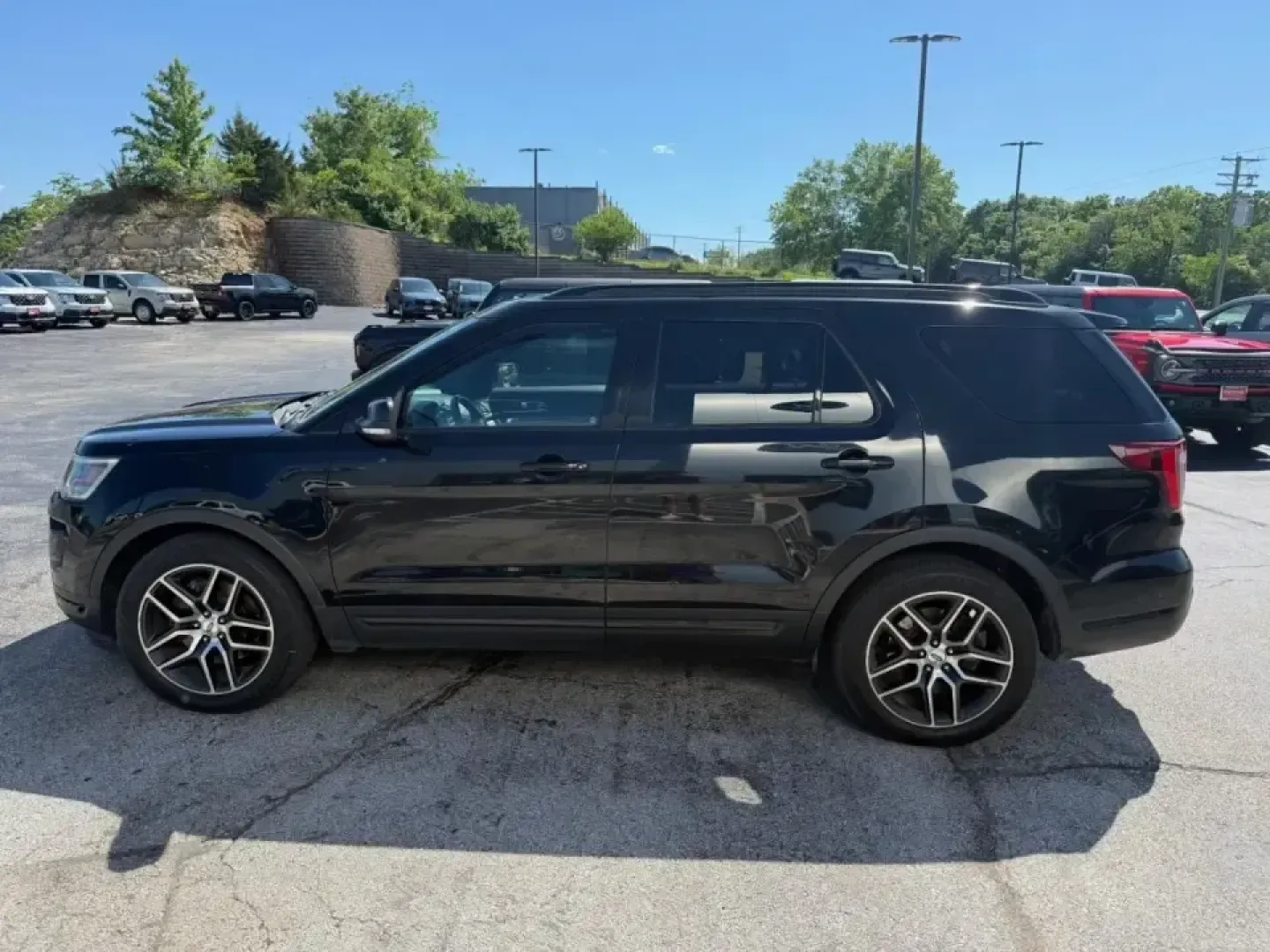 2018 /Ebony Black W/Red Accent Ford Explorer Sport (1FM5K8GT1JG) with an 3.5L V6 DOHC 24V engine, 6A transmission, located at 12836 Highway 21, De Soto, MO, 63020, (636) 337-7777, 38.151867, -90.575615 - Built for families who juggle busy school weeks, long commutes, and weekend getaways to the Ozarks, this **2018 Ford Explorer Sport 4WD** delivers the kind of confident, all-weather capability that makes every mile feel easier. With its bold **Black** exterior, athletic Sport trim, and turbocharged - Photo#0
