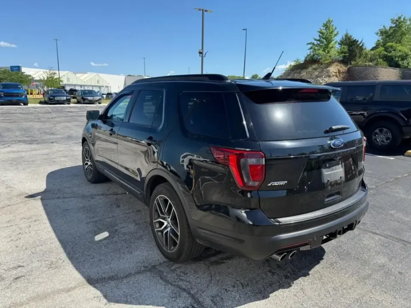 2018 /Ebony Black W/Red Accent Ford Explorer Sport (1FM5K8GT1JG) with an 3.5L V6 DOHC 24V engine, 6A transmission, located at 12836 Highway 21, De Soto, MO, 63020, (636) 337-7777, 38.151867, -90.575615 - Built for families who juggle busy school weeks, long commutes, and weekend getaways to the Ozarks, this **2018 Ford Explorer Sport 4WD** delivers the kind of confident, all-weather capability that makes every mile feel easier. With its bold **Black** exterior, athletic Sport trim, and turbocharged - Photo#1