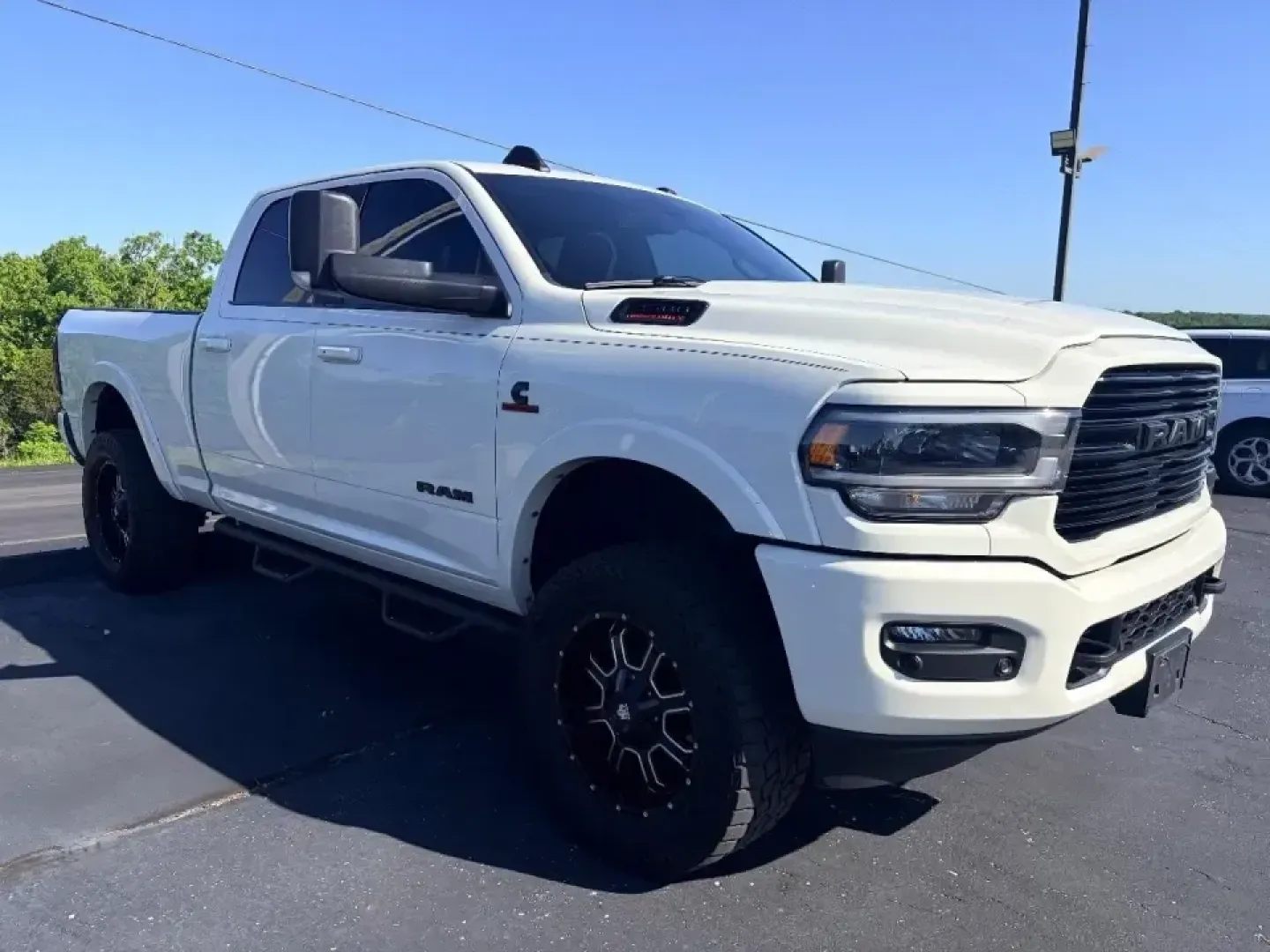2021 /Black Ram 2500 Laramie (3C6UR5FLXMG) with an 6.7L L6 OHV 24V TURBO DIESEL engine, 6A transmission, located at 12830 Highway 21, De Soto, MO, 63020, (636) 337-7777, 38.153099, -90.573624 - If your weekends involve hauling a camper to Washington State Park, towing a trailer out toward the Mark Twain National Forest, or simply powering through long commutes on Highway 21 and I-55, this truck fits the lifestyle. This **2021 Ram 2500 Laramie** is built for drivers who want heavy-duty capa - Photo#1