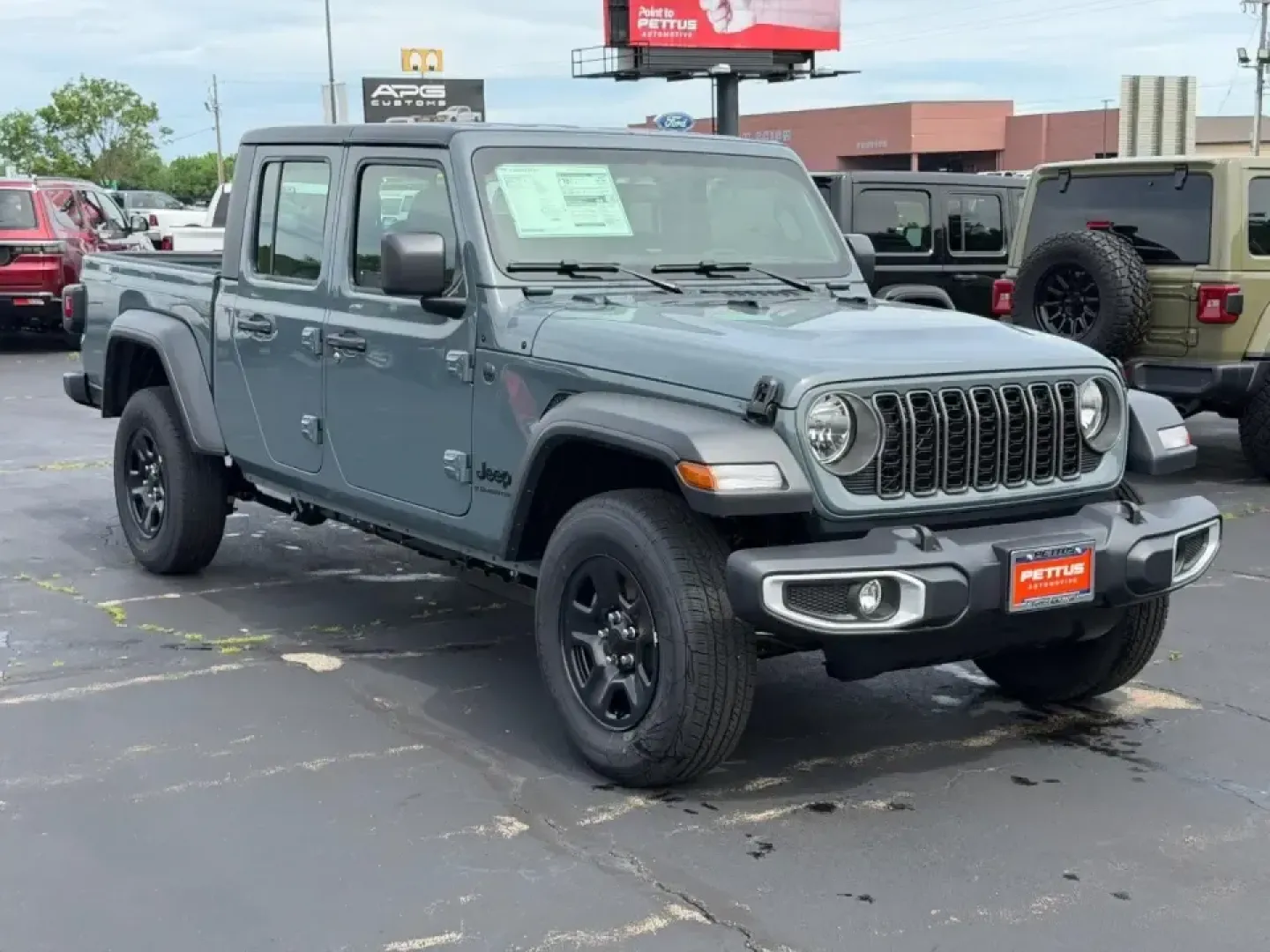 2026 /Black Cloth Jeep Gladiator Sport (1C6PJTAG9TL) with an 3.6L V6 engine, 6M transmission, located at 970 Woodlawn Dr., Farmington, MO, 63640, (573) 431-7800, 37.825642, -90.468674 - When your weekends bounce between hauling gear to St. Joe State Park, cruising K Highway for a quick lake day, and still needing a comfortable daily driver for the commute through Farmington, the right truck has to be more than tough-it has to fit your lifestyle. This 2026 Jeep Gladiator Sport 4WD i - Photo#0
