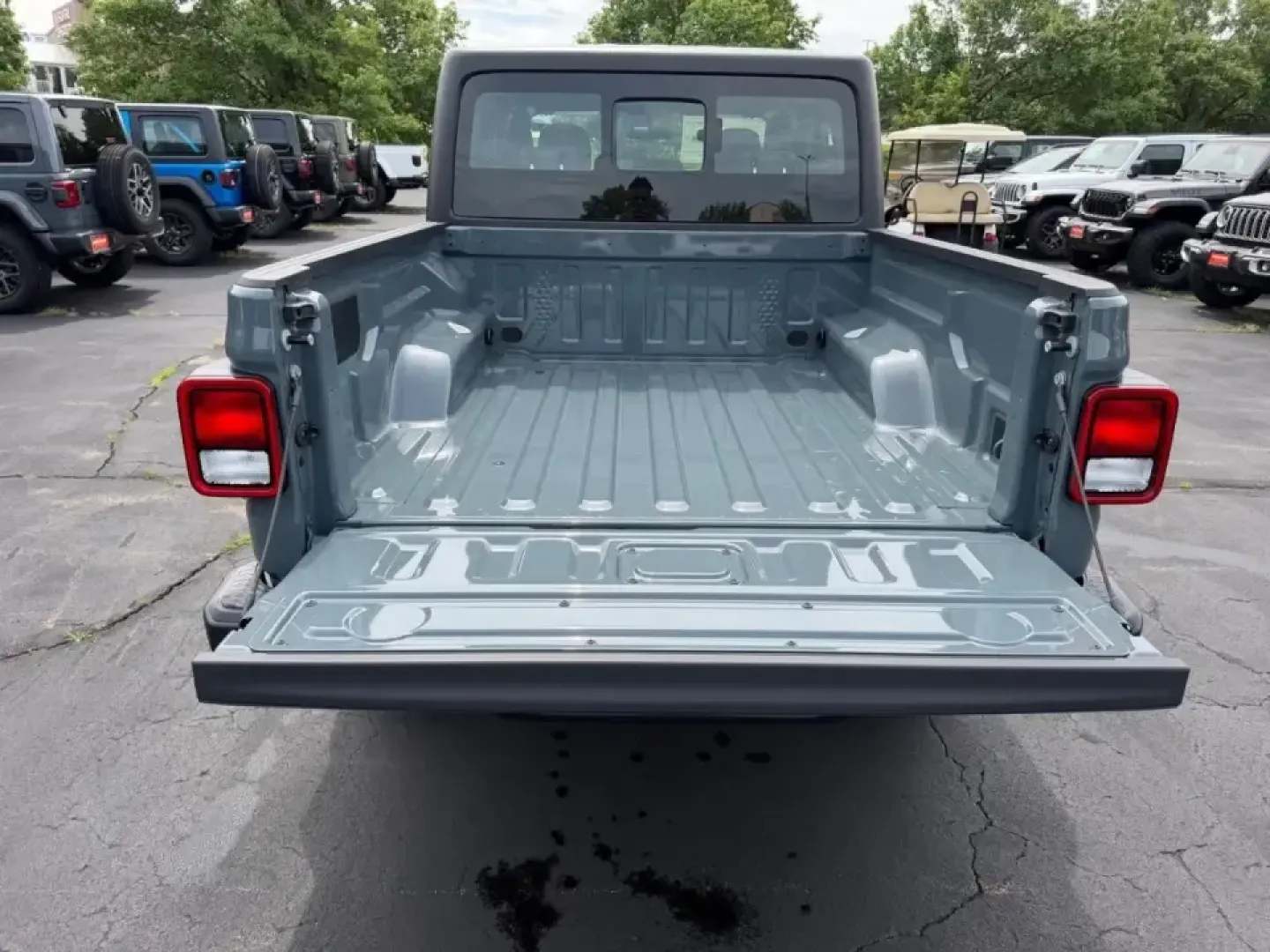 2026 /Black Cloth Jeep Gladiator Sport (1C6PJTAG9TL) with an 3.6L V6 engine, 6M transmission, located at 970 Woodlawn Dr., Farmington, MO, 63640, (573) 431-7800, 37.825642, -90.468674 - When your weekends bounce between hauling gear to St. Joe State Park, cruising K Highway for a quick lake day, and still needing a comfortable daily driver for the commute through Farmington, the right truck has to be more than tough-it has to fit your lifestyle. This 2026 Jeep Gladiator Sport 4WD i - Photo#4