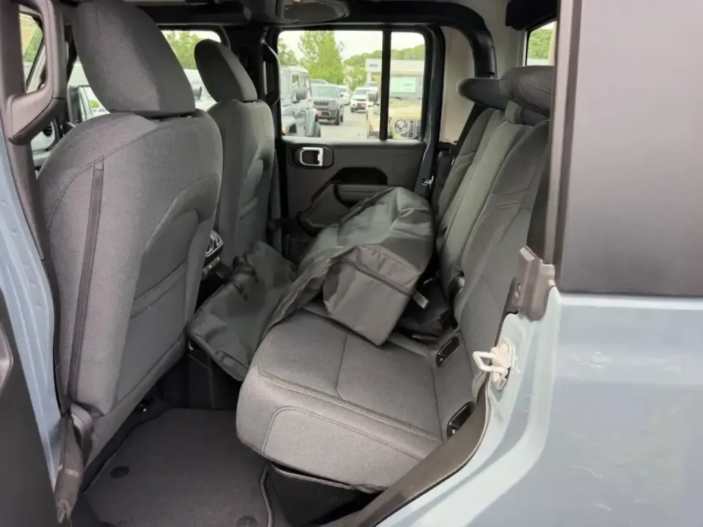 2026 /Black Cloth Jeep Gladiator Sport (1C6PJTAG9TL) with an 3.6L V6 engine, 6M transmission, located at 970 Woodlawn Dr., Farmington, MO, 63640, (573) 431-7800, 37.825642, -90.468674 - When your weekends bounce between hauling gear to St. Joe State Park, cruising K Highway for a quick lake day, and still needing a comfortable daily driver for the commute through Farmington, the right truck has to be more than tough-it has to fit your lifestyle. This 2026 Jeep Gladiator Sport 4WD i - Photo#8