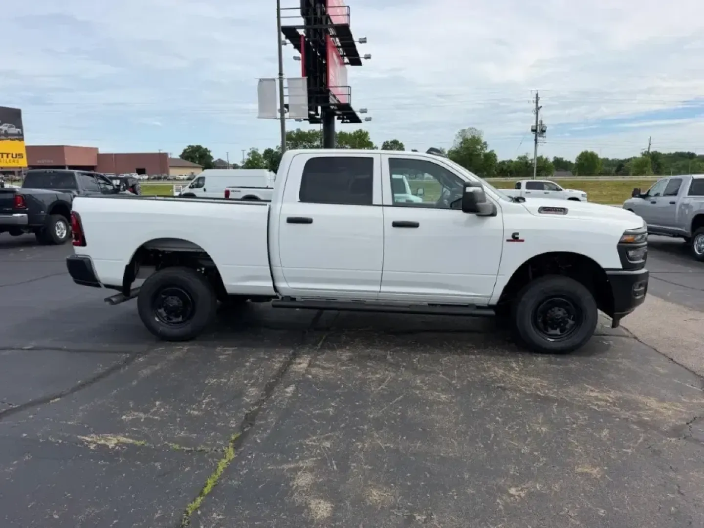 2026 /Diesel Gray/Black Vinyl Ram 2500 Tradesman (3C63R5CL8TG) with an Straight 6 Turbocharged Diesel engine, 6A transmission, located at 970 Woodlawn Dr., Farmington, MO, 63640, (573) 431-7800, 37.825642, -90.468674 - Built for big workdays and bigger weekends, this 2026 Ram 2500 Tradesman is the kind of truck that fits real Missouri life-towing a trailer out past St. Joe State Park, hauling supplies for a jobsite near Karsch Boulevard, or loading up for a long road trip down US-67. With just 25 miles, it deliver - Photo#1