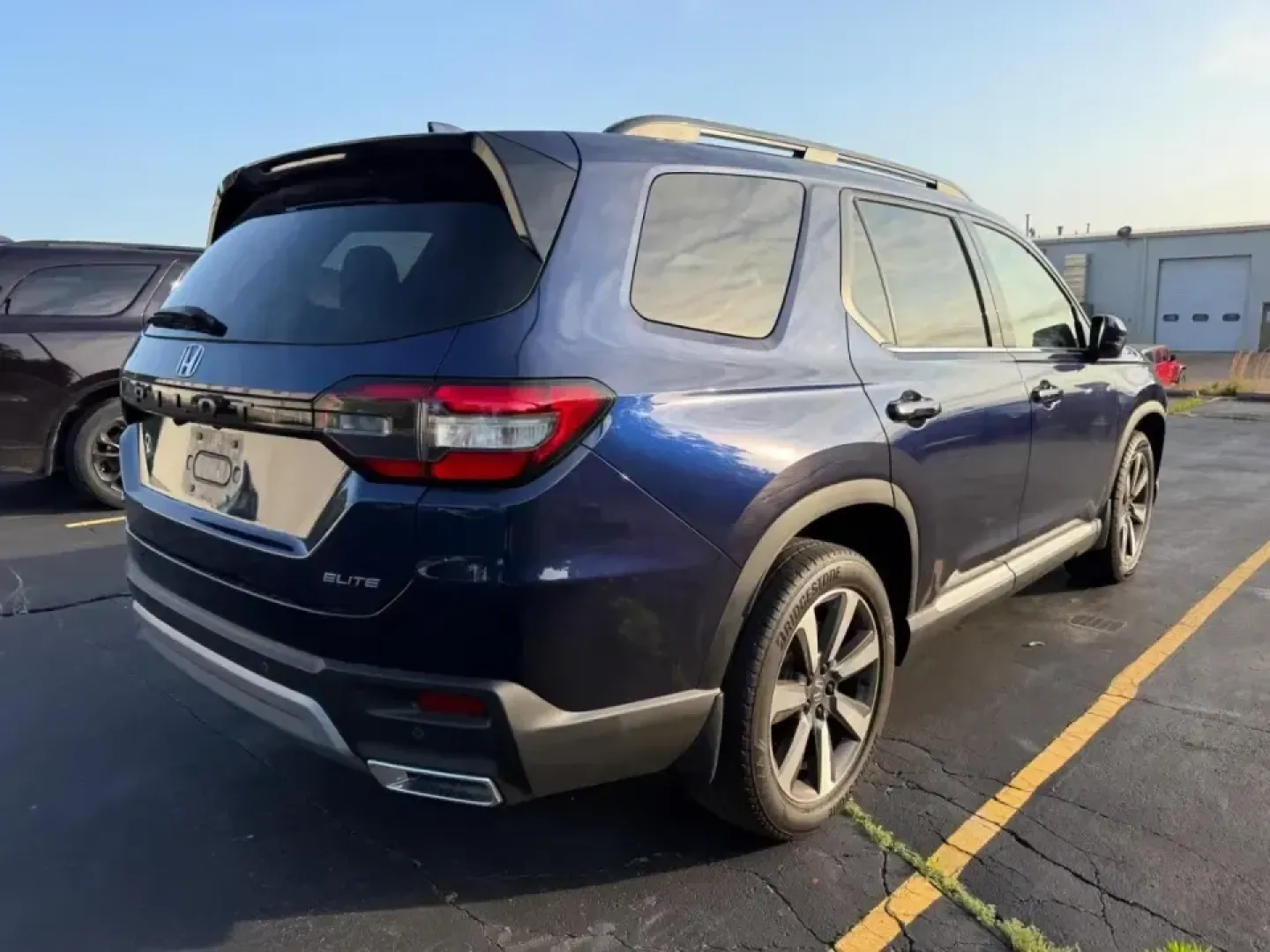 2023 /Gray Leather Honda Pilot Elite (5FNYG1H84PB) with an 3.5L V6 24-Valve DOHC Dual VTC engine, Automatic transmission, located at 970 Woodlawn Dr., Farmington, MO, 63640, (573) 431-7800, 37.825642, -90.468674 - Pack the family, load up the gear, and point the nose toward a weekend at St. Joe State Park or a day of errands across Farmington-this 2023 Honda Pilot Elite AWD is built for real life in Missouri, from school drop-offs to road-trip getaways. With three rows, smart safety tech, and premium comfort, - Photo#1