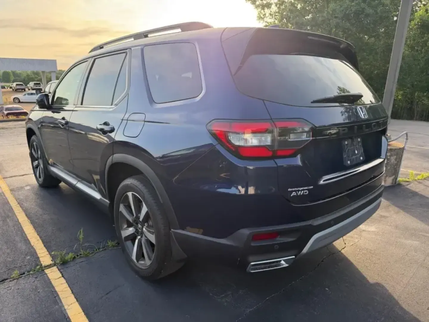 2023 /Gray Leather Honda Pilot Elite (5FNYG1H84PB) with an 3.5L V6 24-Valve DOHC Dual VTC engine, Automatic transmission, located at 970 Woodlawn Dr., Farmington, MO, 63640, (573) 431-7800, 37.825642, -90.468674 - Pack the family, load up the gear, and point the nose toward a weekend at St. Joe State Park or a day of errands across Farmington-this 2023 Honda Pilot Elite AWD is built for real life in Missouri, from school drop-offs to road-trip getaways. With three rows, smart safety tech, and premium comfort, - Photo#2