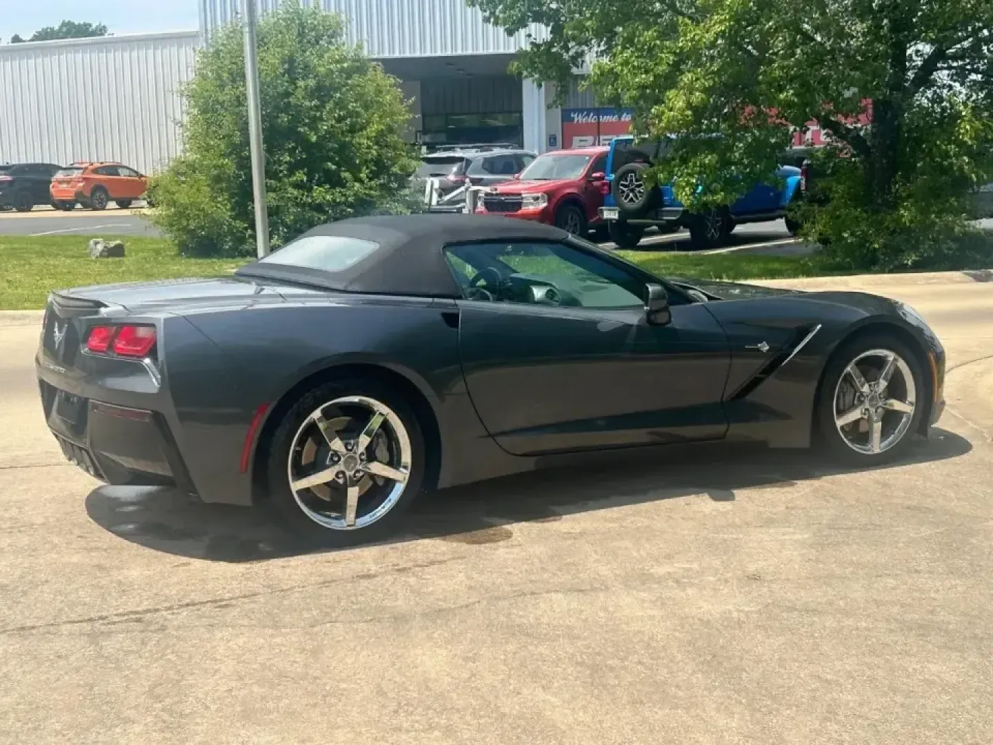2014 /Black Chevrolet Corvette Stingray Base 3LT (1G1YF3D74E5) with an Other engine, Automatic transmission, located at 970 Woodlawn Dr., Farmington, MO, 63640, (573) 431-7800, 37.825642, -90.468674 - Top-down sunsets on Highway 67, a quick escape to St. Joe State Park, or a Friday-night cruise through downtown Farmington-this 2014 Chevrolet Corvette Stingray Convertible was made for drivers who want their commute to feel like a mini road trip. With its sleek Cyber Gray Metallic exterior and Jet - Photo#7