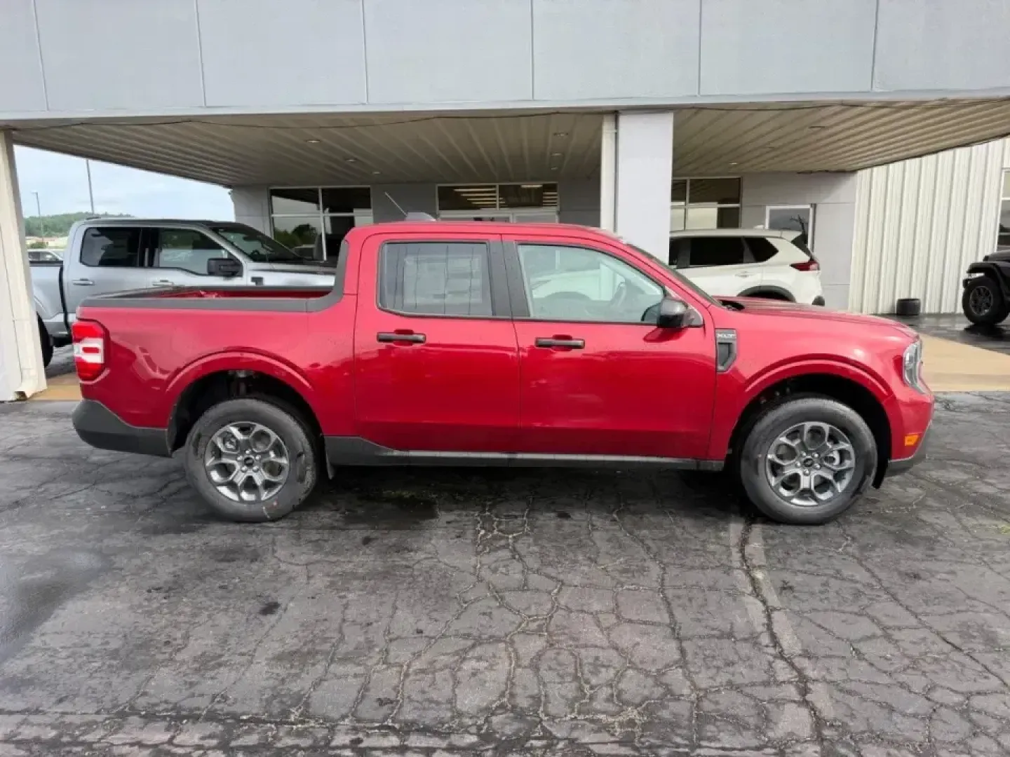 2026 /Navy Pier/Aspen Gray Cloth Ford Maverick XLT (3FTTW8JA6TR) with an 2.0L engine, CVT transmission, located at 141 Commercial Dr, Fredericktown, MO, 63645, (573) 783-6432, 37.570087, -90.320648 - Weekend projects, lake days, and long commutes through the Ozarks all get easier when your truck fits real life-easy to park, comfortable for the crew, and ready for whatever the week throws at you. This **2026 Ford Maverick XLT** in **Ruby Red** is built for drivers who want pickup versatility with - Photo#1